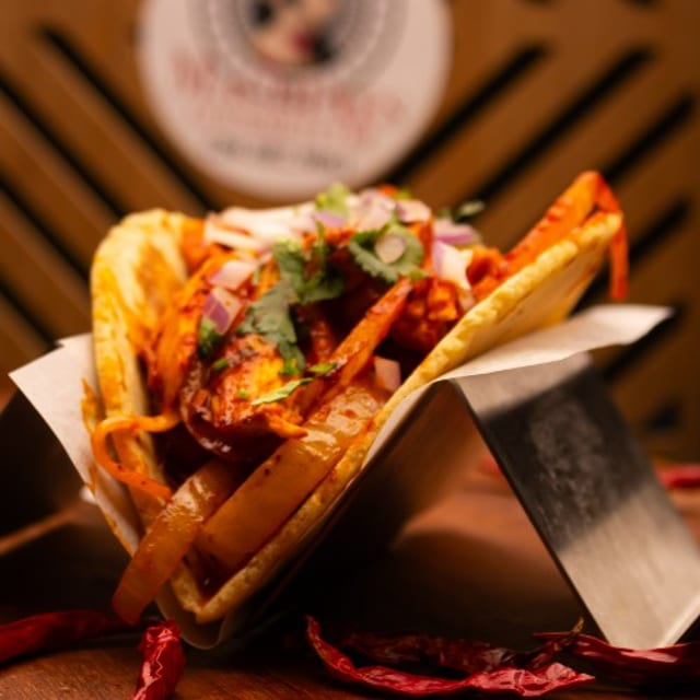 Tinga De Pollo Taco.